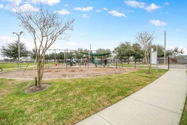 view of playground with a yard