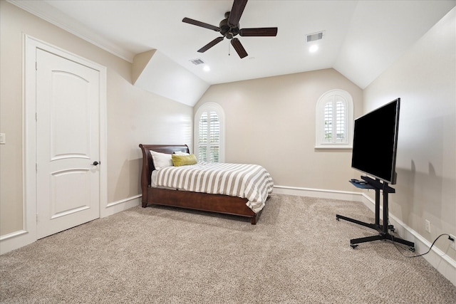 carpeted bedroom featuring visible vents, multiple windows, and lofted ceiling