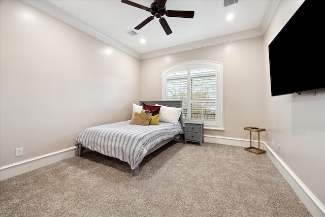 carpeted bedroom featuring visible vents, recessed lighting, baseboards, and ornamental molding