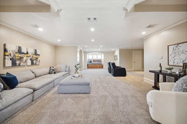 carpeted living room featuring recessed lighting, visible vents, baseboards, and crown molding