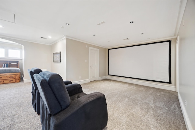 cinema with visible vents, recessed lighting, carpet, crown molding, and baseboards