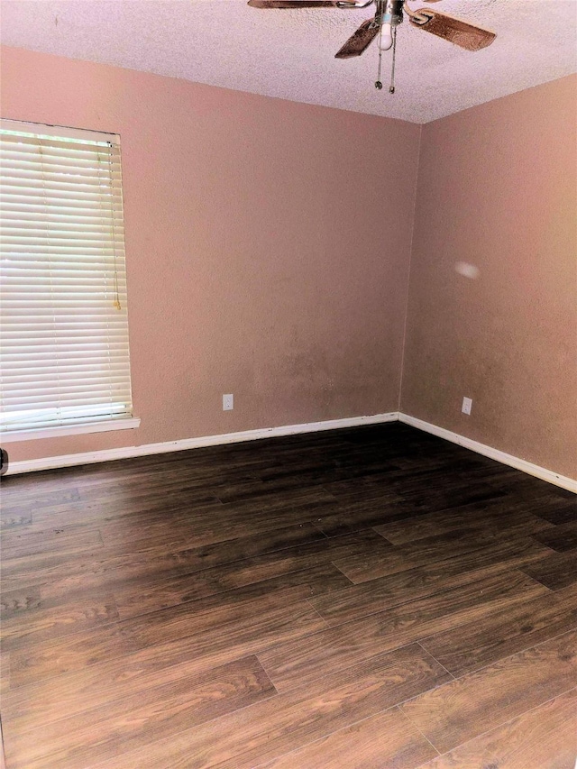 250 El Dorado Unit 296, Webster, TX 77598 - spare room featuring ceiling fan, wood finished floors, baseboards, and a textured ceiling