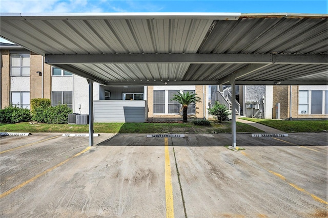 view of car parking featuring a carport