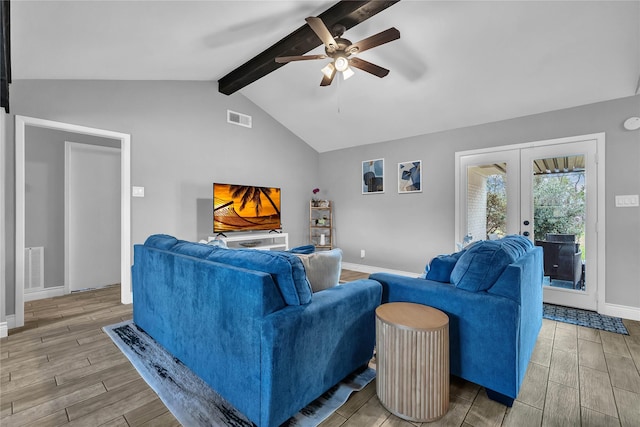 living room with french doors, ceiling fan, and lofted ceiling with beams