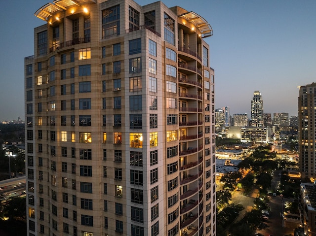 view of outdoor building at dusk