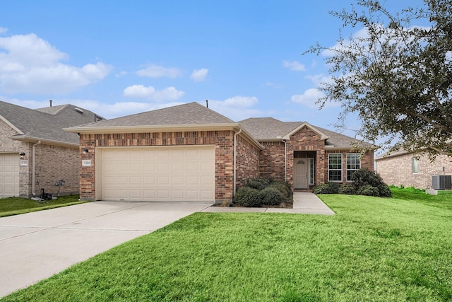 single story home with a garage, central air condition unit, and a front lawn