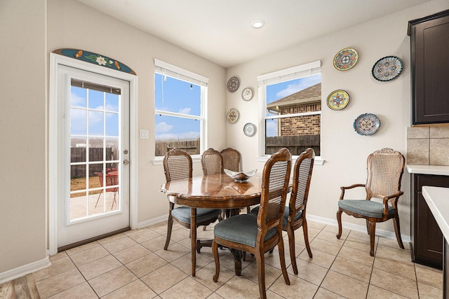 view of tiled dining space