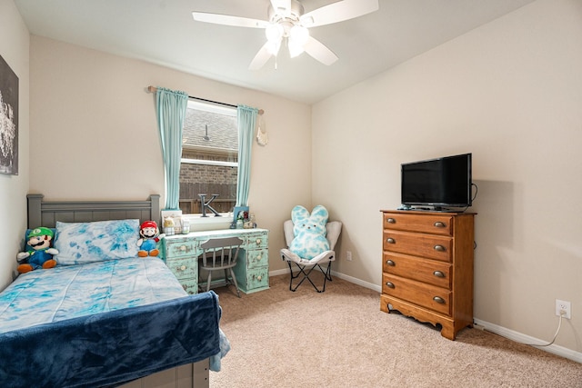 bedroom featuring light carpet and ceiling fan