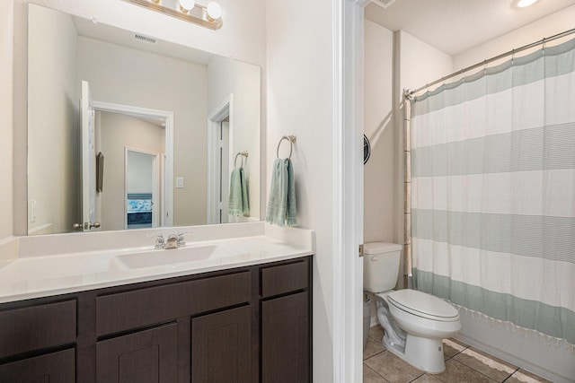 full bathroom with shower / bathtub combination with curtain, tile patterned floors, toilet, and vanity