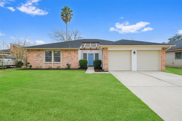 ranch-style house featuring a garage and a front yard