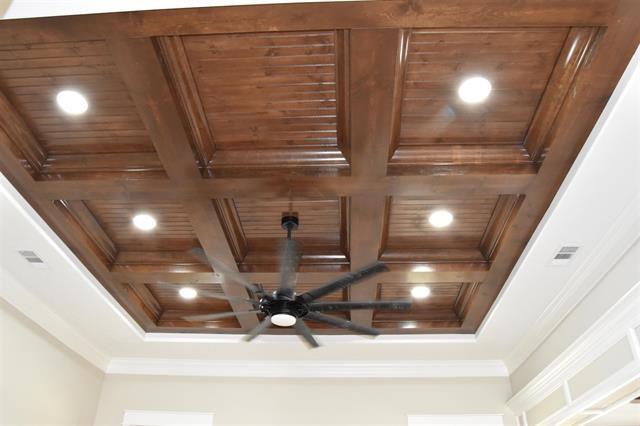 details featuring crown molding, coffered ceiling, and wooden ceiling