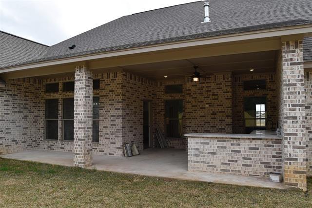 view of patio / terrace featuring ceiling fan