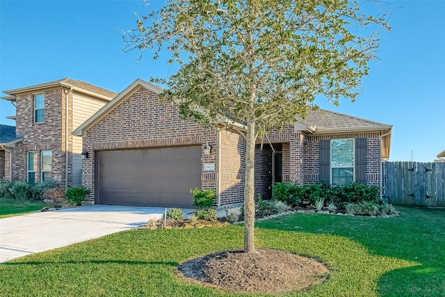 view of front of house with a garage and a front lawn