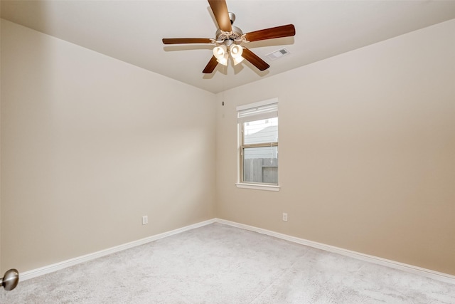 carpeted empty room with ceiling fan