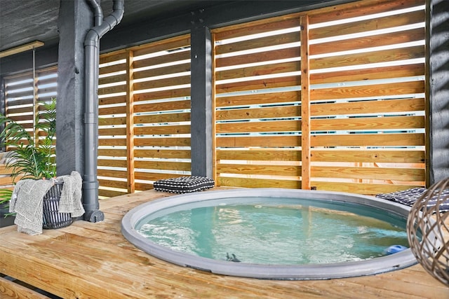 view of pool featuring an indoor hot tub