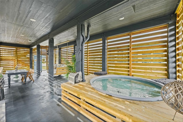 wooden terrace featuring an indoor hot tub