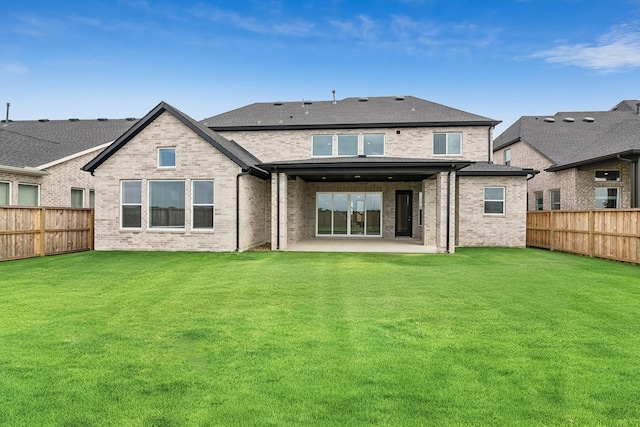 20406 Magnolia Flint Dr, Cypress, TX 77433 - back of property with a fenced backyard, a patio area, and brick siding