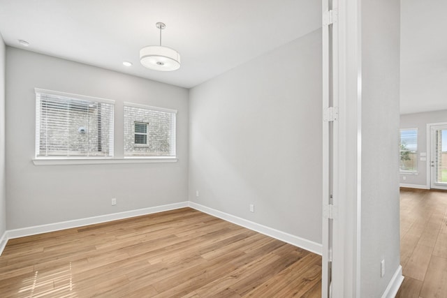 20406 Magnolia Flint Dr, Cypress, TX 77433 - spare room featuring baseboards and wood finished floors