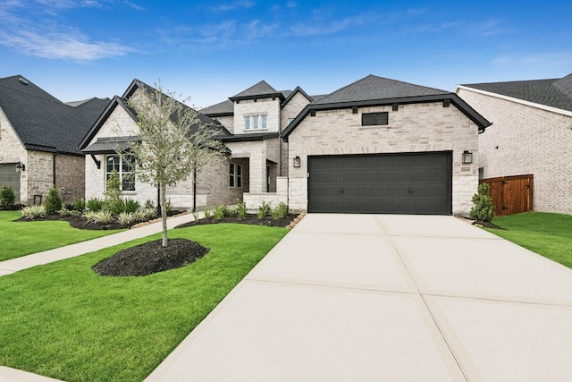 20406 Magnolia Flint Dr, Cypress, TX 77433 - french country style house featuring stone siding, driveway, roof with shingles, and brick siding