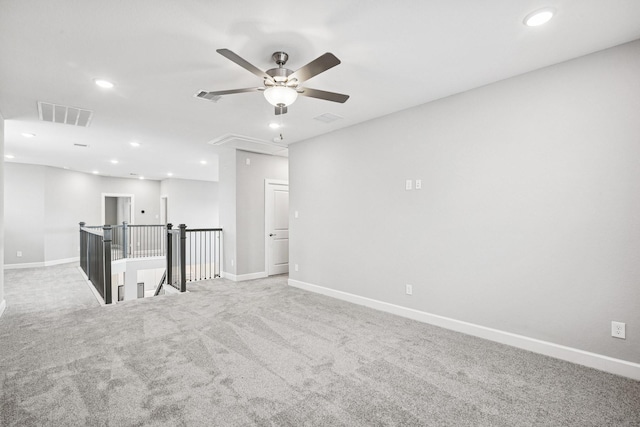 20406 Magnolia Flint Dr, Cypress, TX 77433 - spare room featuring attic access, recessed lighting, a ceiling fan, and light colored carpet