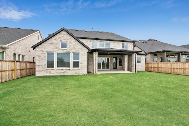 20406 Magnolia Flint Dr, Cypress, TX 77433 - back of property with brick siding, a fenced backyard, and a patio