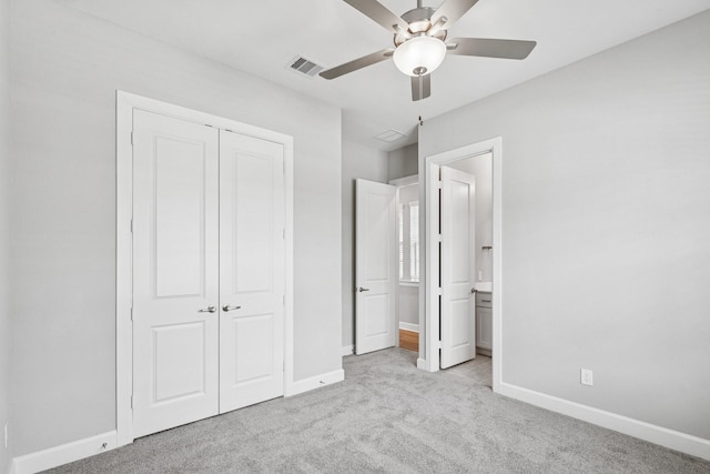 20406 Magnolia Flint Dr, Cypress, TX 77433 - unfurnished bedroom with carpet, a closet, and a ceiling fan