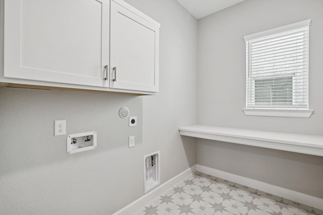 20406 Magnolia Flint Dr, Cypress, TX 77433 - washroom with cabinet space, hookup for an electric dryer, light floors, and washer hookup