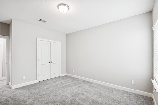 20406 Magnolia Flint Dr, Cypress, TX 77433 - unfurnished bedroom featuring carpet flooring and a closet