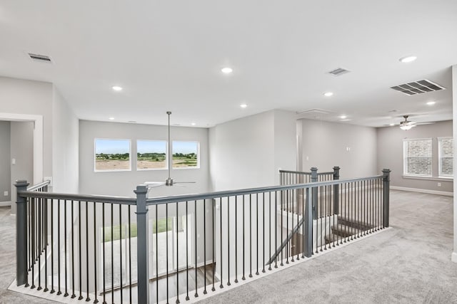 20406 Magnolia Flint Dr, Cypress, TX 77433 - hall featuring attic access, carpet flooring, an upstairs landing, recessed lighting, and healthy amount of natural light