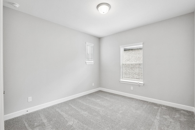20406 Magnolia Flint Dr, Cypress, TX 77433 - carpeted empty room with baseboards