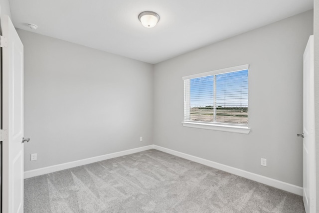 20406 Magnolia Flint Dr, Cypress, TX 77433 - empty room featuring carpet floors and a smoke detector