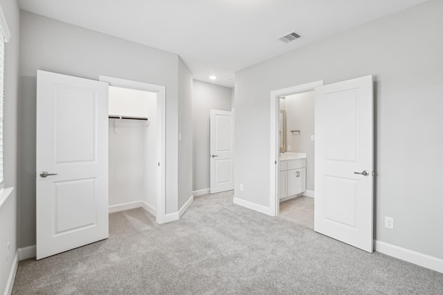 20406 Magnolia Flint Dr, Cypress, TX 77433 - unfurnished bedroom with light carpet, recessed lighting, and ensuite bath