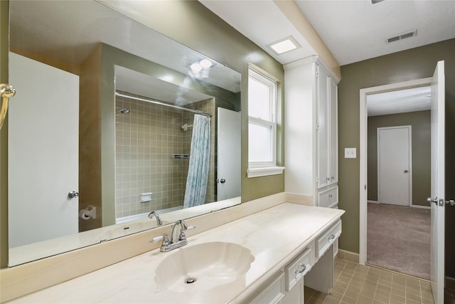 bathroom featuring vanity and tile patterned floors