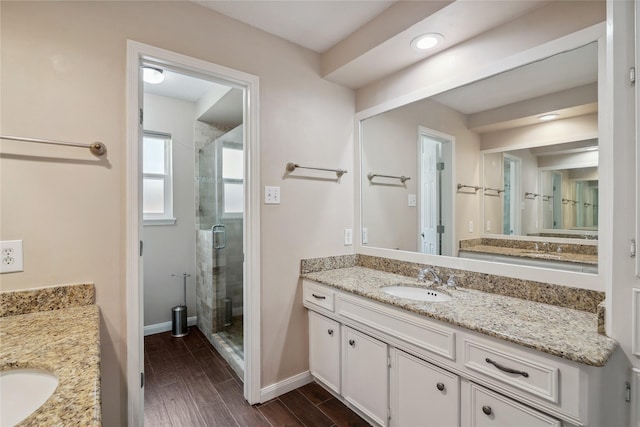 bathroom featuring vanity and walk in shower