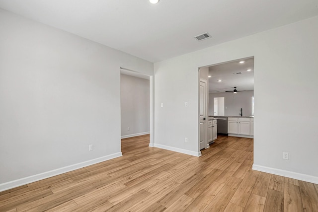 unfurnished room featuring light wood-type flooring