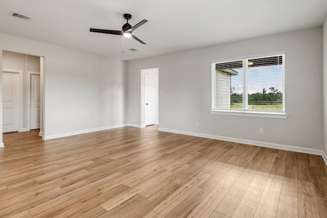 unfurnished room featuring ceiling fan and light hardwood / wood-style floors