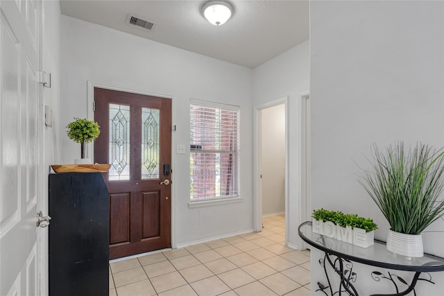 view of tiled foyer entrance