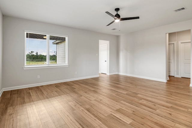 unfurnished room featuring ceiling fan and light hardwood / wood-style flooring