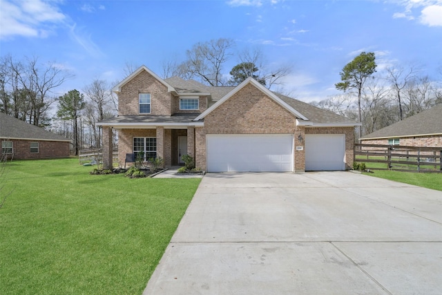 view of front of house featuring concrete driveway, an attached garage, fence, a front yard, and brick siding