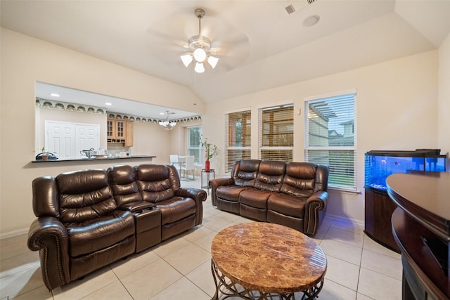 tiled living room featuring lofted ceiling and ceiling fan