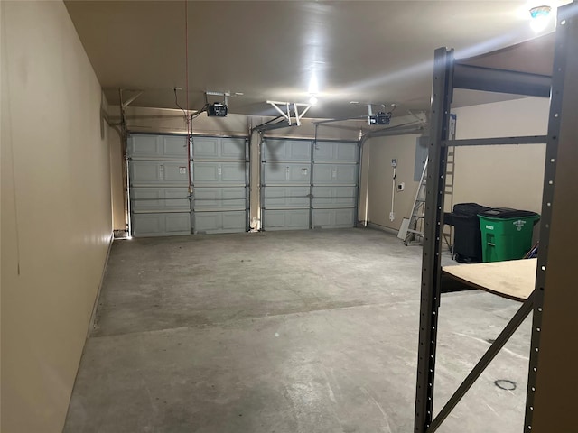 garage featuring a garage door opener