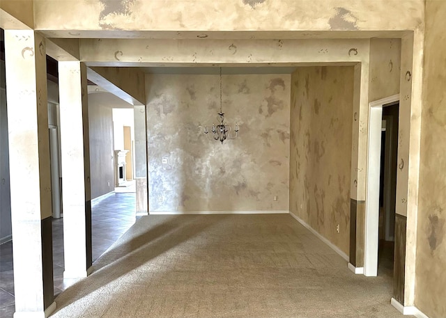 carpeted spare room featuring a fireplace