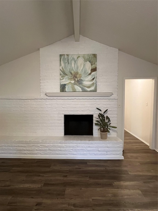 details with hardwood / wood-style floors, beam ceiling, and a brick fireplace