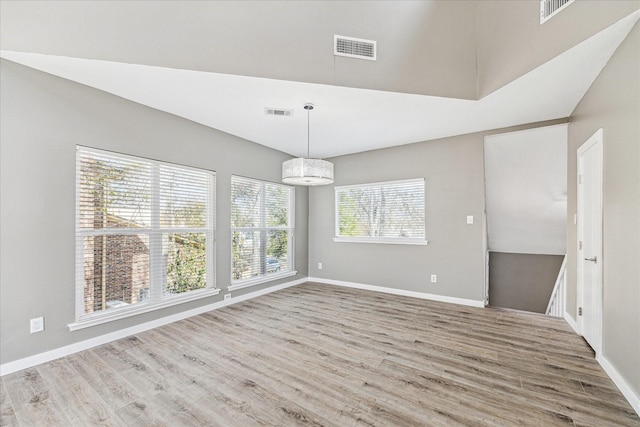 unfurnished dining area with hardwood / wood-style floors