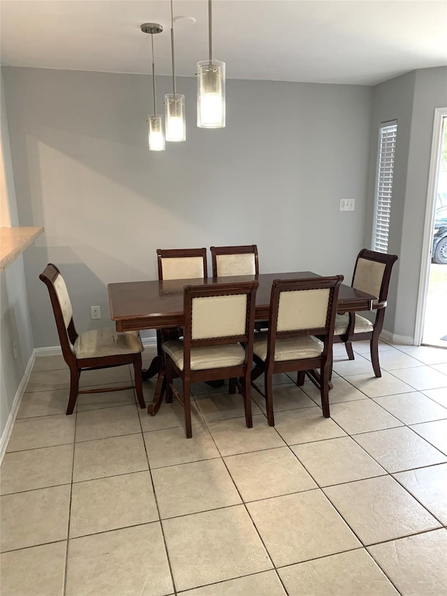 view of tiled dining space