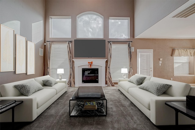 living room with a high ceiling