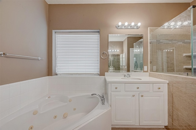 bathroom featuring vanity and separate shower and tub