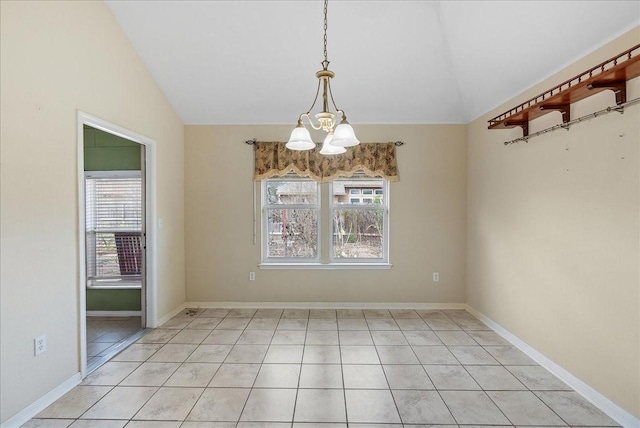 unfurnished dining area featuring a notable chandelier, vaulted ceiling, and plenty of natural light