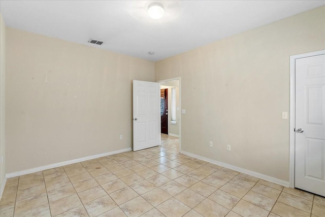 view of tiled empty room