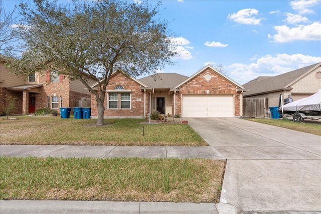 view of front of property featuring a garage and a front yard